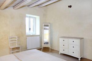 Letto o letti in una camera di Borgo del Carato