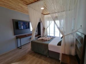 A bed or beds in a room at Royal Villa
