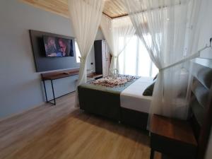 A bed or beds in a room at Royal Villa