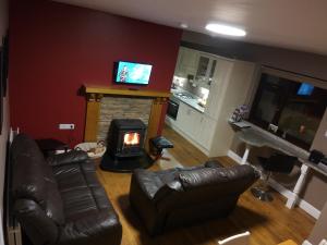 Posezení v ubytování Helens Self Catering