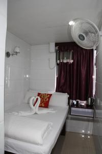 Voodi või voodid majutusasutuse Pay-Less Guesthouse (7/F A9) toas