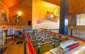 a group of people standing in a bowling alley at Amazing Home In Tolmin With Sauna in Tolmin