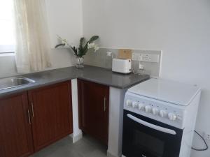 Cucina o angolo cottura di Amssler Beach Stay