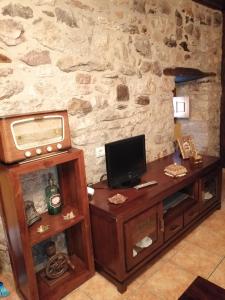 TV a/nebo společenská místnost v ubytování APARTAMENTOS RURALES EL PRIVILEGIO