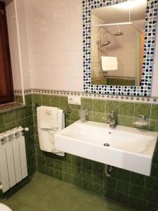 Koupelna v ubytování APARTAMENTOS RURALES EL PRIVILEGIO