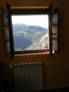 Nespecifikovaný výhled na hory nebo výhled na hory při pohledu z apartmánu