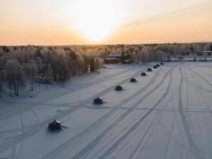 an aerial view of a road in the snow at Arctic Guesthouse & Igloos in Ranua