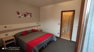 Postel nebo postele na pokoji v ubytování Hotel Del Negro