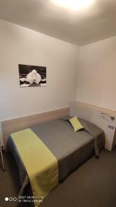 Postel nebo postele na pokoji v ubytování Hotel Del Negro