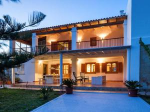 a villa with a view of a house at Villa Wicker in Sant Jordi