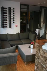 Uma área de estar em Hotel Carpinus