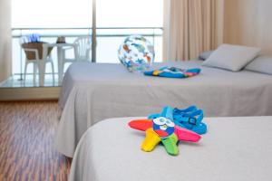 Posteľ alebo postele v izbe v ubytovaní RVHotels Ametlla Mar