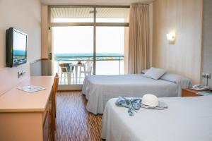 Posteľ alebo postele v izbe v ubytovaní RVHotels Ametlla Mar