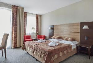 Posteľ alebo postele v izbe v ubytovaní Hotel Diva SPA