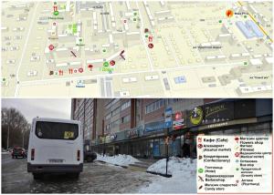 um mapa e um autocarro branco numa rua da cidade em Hotel 7 Dorog em Irkutsk