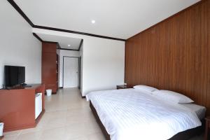 Posteľ alebo postele v izbe v ubytovaní AT TP HOTEL