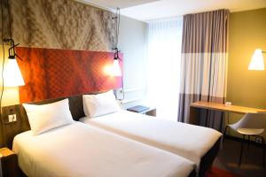 Letto o letti in una camera di ibis Aachen Marschiertor - Aix-la-Chapelle