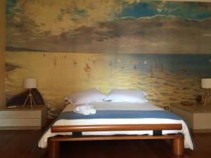 Postel nebo postele na pokoji v ubytování Casa di Lucia B&B