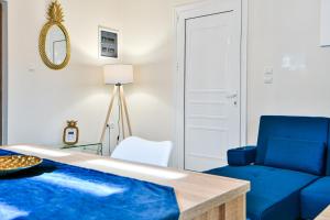 Ένα ή περισσότερα κρεβάτια σε δωμάτιο στο Koukounari Luxury Apartments