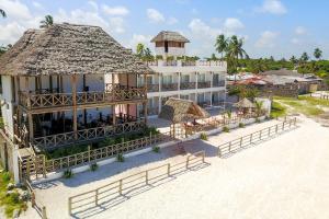 an aerial view of a hotel on the beach at Isla Bonita Zanzibar Beach Resort in Matemwe