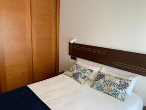 Ένα ή περισσότερα κρεβάτια σε δωμάτιο στο Apartamentos Illa