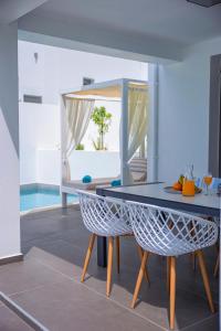 a dining room with a table and chairs at Adrianna Villa 4ppl in Bali