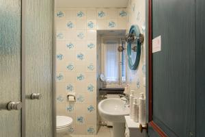 Koupelna v ubytování Creuza de Ma by Wonderful Italy + 24 fotografií