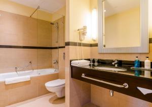 Um banheiro em Hotel Polonia Palace