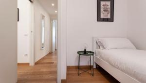 A bed or beds in a room at Italianway - Palladio 16