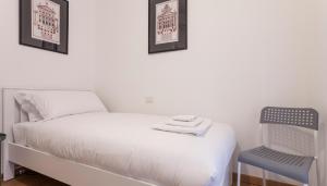A bed or beds in a room at Italianway - Palladio 16