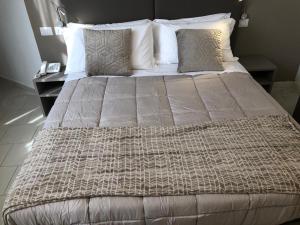 Postel nebo postele na pokoji v ubytování Hotel Inn