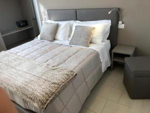 Postel nebo postele na pokoji v ubytování Hotel Inn