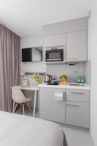 Kuchyň nebo kuchyňský kout v ubytování VISIONAPARTMENTS Lucerne - contactless check-in