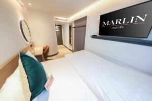 TV a/nebo společenská místnost v ubytování Marlin Hotel Stephens Green