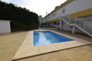 Bazén v ubytování COMERCIAL LEPANTO - FINCAS ARENA nebo v jeho okolí