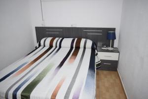 Postel nebo postele na pokoji v ubytování COMERCIAL LEPANTO - FINCAS ARENA