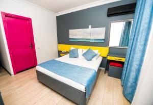 Postel nebo postele na pokoji v ubytování Mera Park Hotel