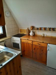 Kuchyň nebo kuchyňský kout v ubytování Ferienhaus Kerstin