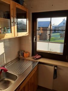 Kuchyň nebo kuchyňský kout v ubytování Ferienhaus Kerstin