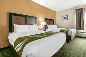 Postel nebo postele na pokoji v ubytování Quality Inn Monteagle