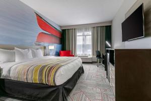 Voodi või voodid majutusasutuse Clarion Pointe Columbus-Bradley Park toas