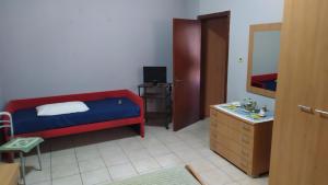 Casa fiordaliso tesisinde bir odada yatak veya yataklar