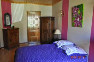 Postel nebo postele na pokoji v ubytování Ma maison bleue