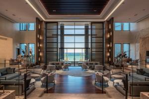 a lobby with a view of the ocean at Amara - Sea Your Only View™ in Limassol