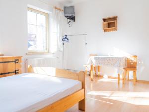 Posteľ alebo postele v izbe v ubytovaní Willa Ślimakówka