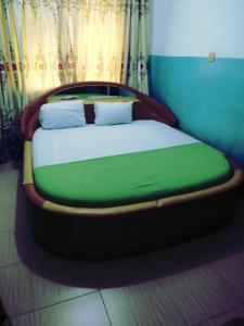 Llit o llits en una habitació de Elizz guest house