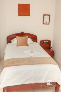 Cama o camas de una habitación en Hotel Suite Luna del Valle