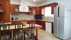 Kuchyň nebo kuchyňský kout v ubytování La Maison des Hôtes