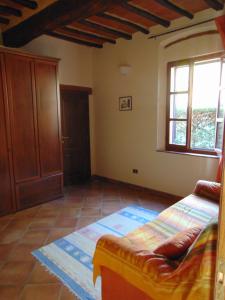 Ένα ή περισσότερα κρεβάτια σε δωμάτιο στο Casa Vacanze L'Oliveta +75 φωτογραφίες