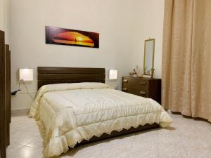 Posteľ alebo postele v izbe v ubytovaní MONFENERA APARTMENT 3